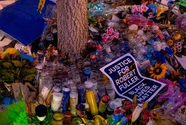 A makeshift memorial is pictured at the tree where Robert Fuller was found dead outside Palmdale City after a Juneteenth demonstration in Palmdale