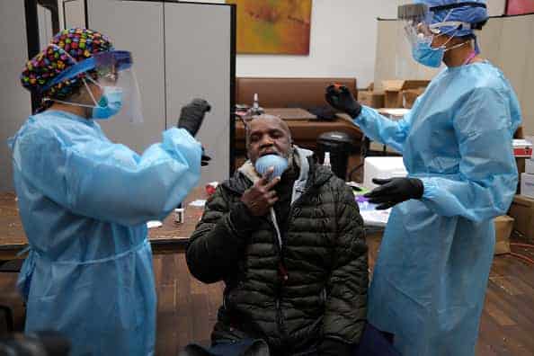 Medical workers in personal protective equipment (PPE) test for COViD-19 at Abyssinian Baptist Church