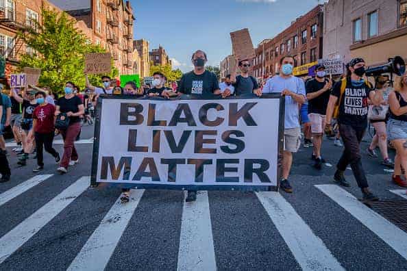 2020/07/12: A crowd od counterprotesters marching behind a Black Lives Matter banner at the protest. Pro-NYPD marchers clashed with a big crowd of Black Lives Matter counterprotesters during the Ã¬Back the BlueÃ® rally and march in Bay Ridge