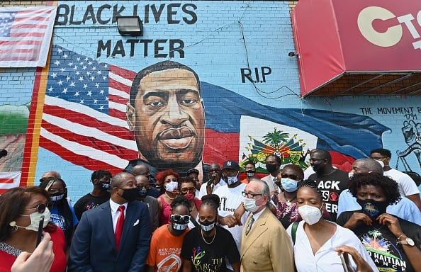 Terrence Floyd(Center back) together with attendees Democratic Rep. Yvette Clarke