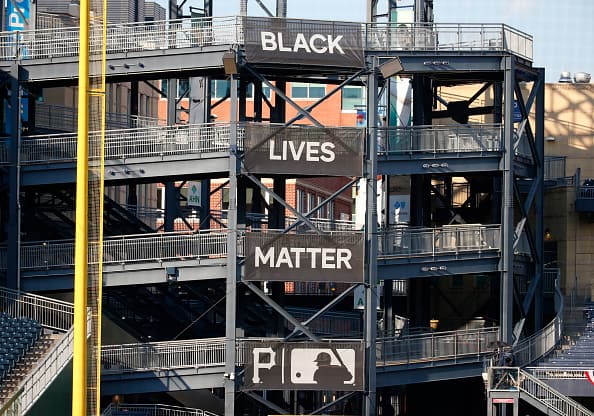 Black Lives Matter banners are seen in the left field rotunda during the Opening Day game between the Pittsburgh Pirates and the Milwaukee Brewers at PNC Park on July 27