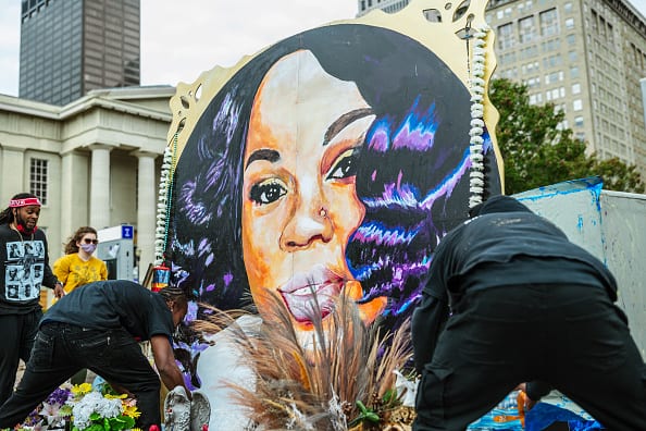 Demonstrators maintain the decorations around the Breonna Taylor memorial in Jefferson Square Park on September 30