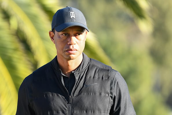Tiger Woods looks on from the 18th hole during the final round of The Genesis Invitational golf tournament at the Riviera Country Club in Pacific Palisades