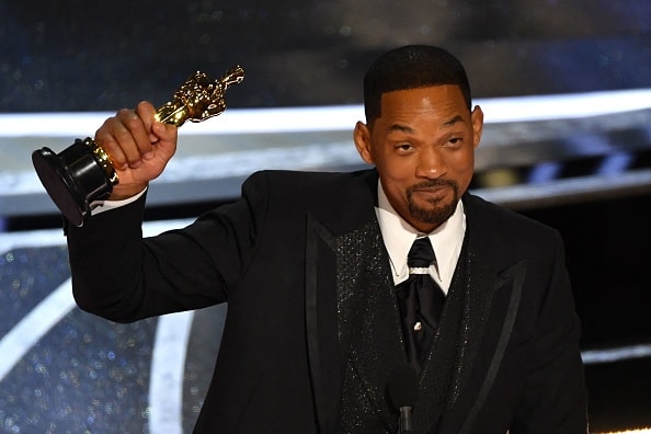 TOPSHOT - US actor Will Smith accepts the award for Best Actor in a Leading Role for "King Richard" onstage during the 94th Oscars at the Dolby Theatre in Hollywood