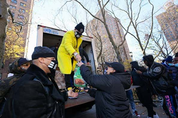 Hip-hop artist French Montana distributes turkeys to New Yorkers in need in South Bronx on November 23