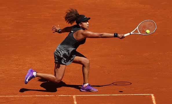 Naomi Osaka of Japan hist a backhand return during the second round match between Karolina Muchova of Czech and Naomi Osaka of Japan on day 4 of the Mutua Madrid Open at La Caja Magica on May 02