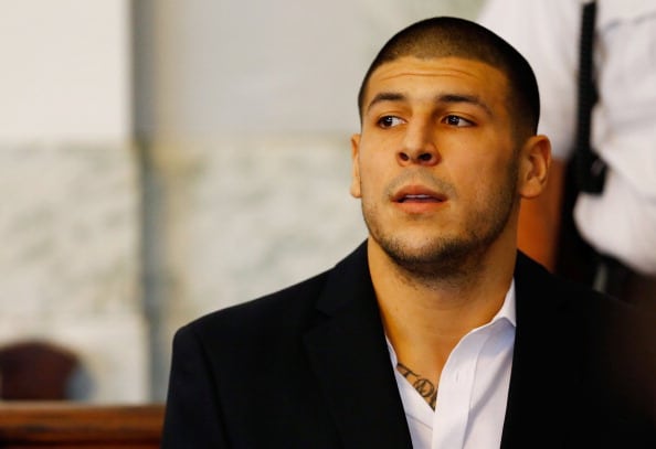 Aaron Hernandez sits in the courtroom of the Attleboro District Court during his hearing on August 22