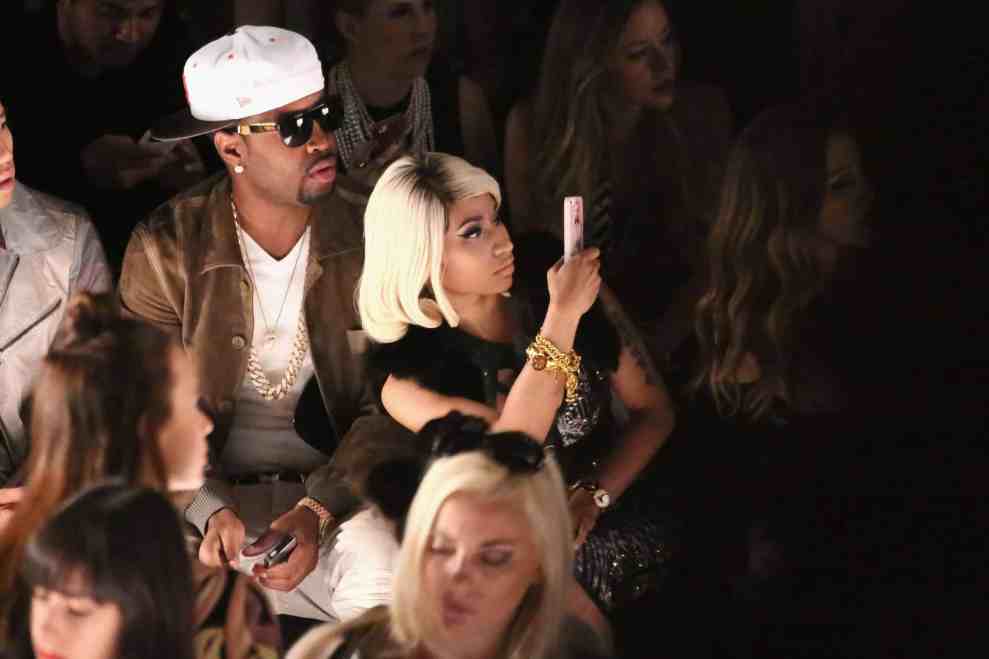 Safaree and Nicki Minaj  attend the Herve Leger By Max Azria fashion show during Mercedes-Benz Fashion Week Spring 2014