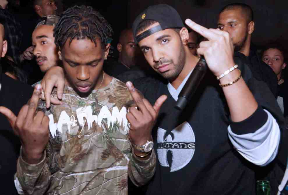 Travi$ Scott & Drake giving the finger
