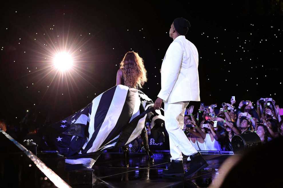 Beyoncé and Jay Z erform during the "On The Run Tour: Beyonce And Jay-Z" at the Rose Bowl on August 2