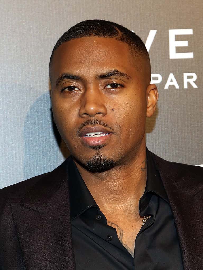 Nas wearing all black