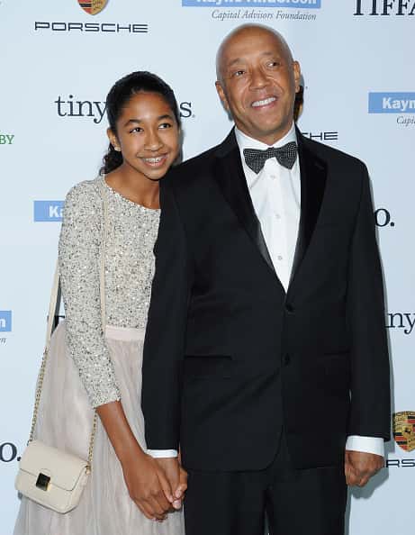 Business magnate Russell Simmons and daughter Aoki Lee Simmons arrive at the 2014 Baby2Baby Gala presented by Tiffany & Co. hono
