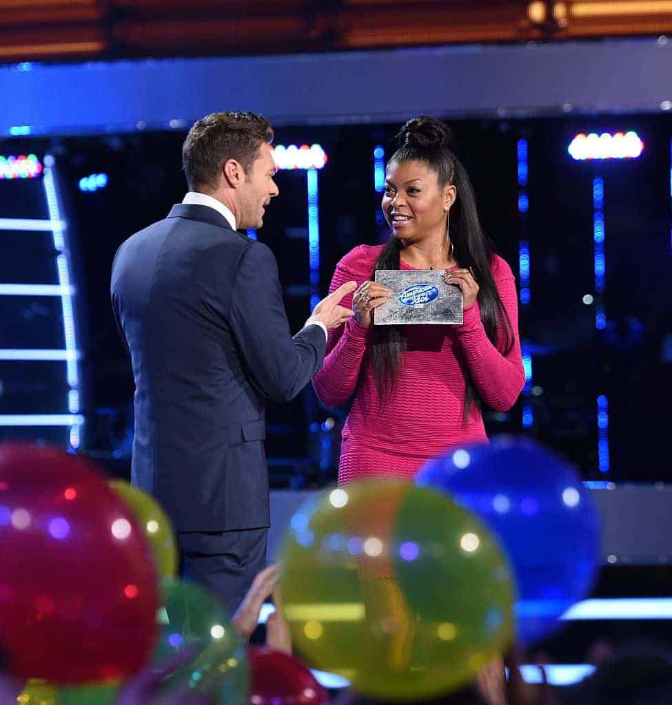 Taraji P. Henson delivers the envelope to Ryan Seacrest on FOX's "American Idol" - Season Fourteen