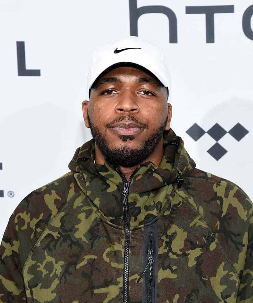 Quentin Miller wearing green army fatigue jacket