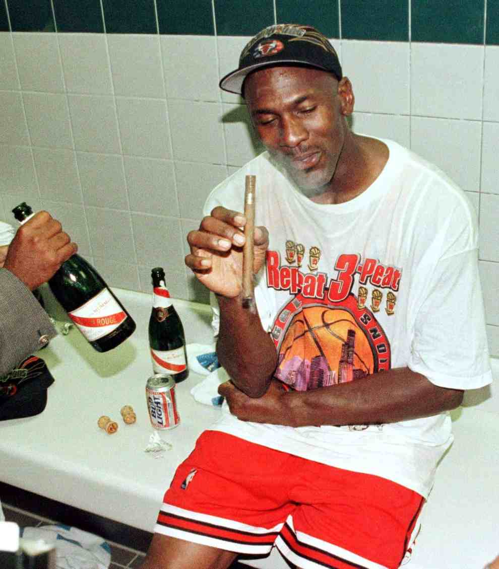 Michael Jordan smoking a cigar