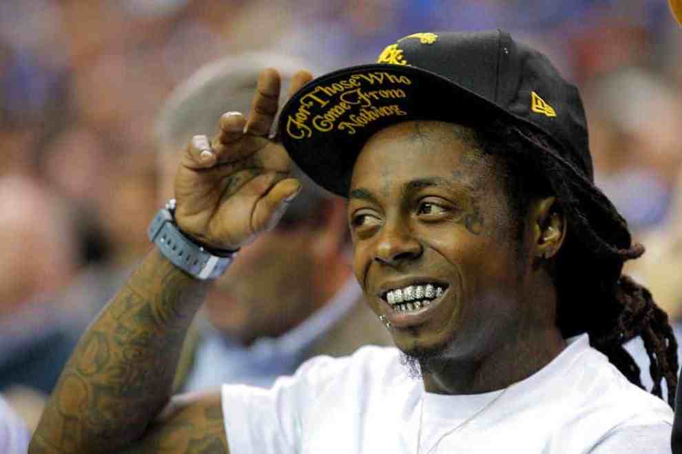 Lil Wayne stands at NCAA BASKETBALL: NOV 13 Champions Classic - Kentucky v Duke