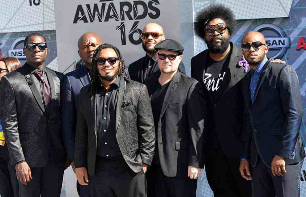 The Roots wearing all black