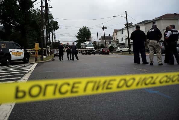 Law enforcement officers secure the area where they allegedly arrested terror suspect Ahmad Khan Rahami following a shootout in Linden