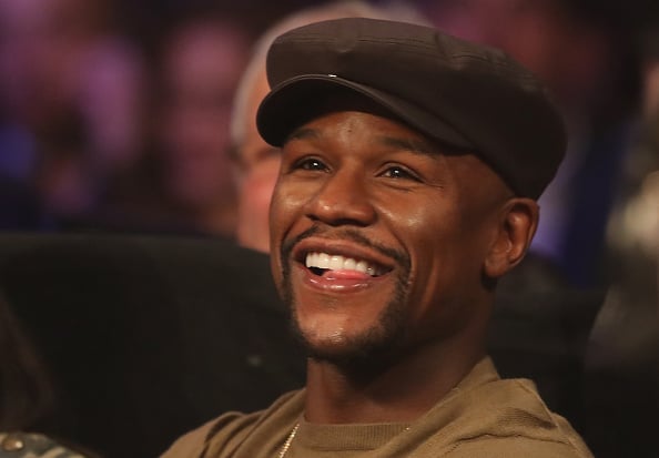 Floyd Mayweather Jr. watches ringside during the WBO featherweight championship fight between Oscar Valdez of Mexico and Osawa Hiroshige of Japan at the Thomas & Mack Center on November 5