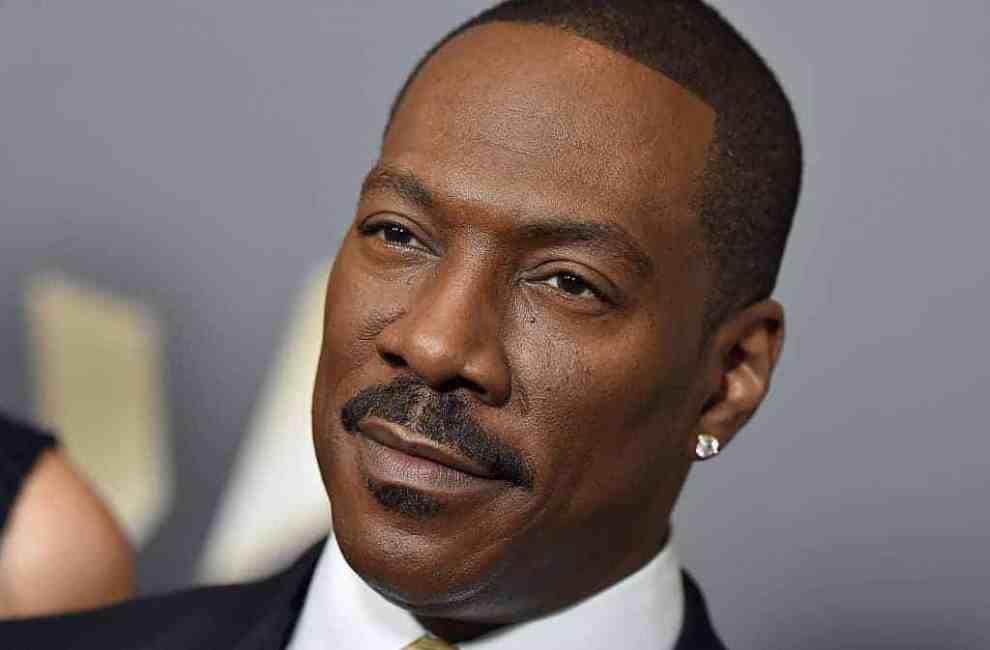 Eddie Murphy wearing black and white