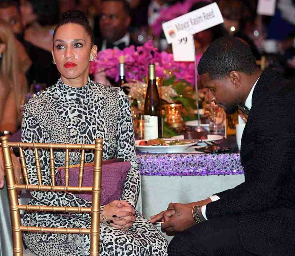 Grace Miguel and Usher Raymond attend the 33rd annual UNCF Mayors Masked Ball at Atlanta Marriott Marquis on December 17