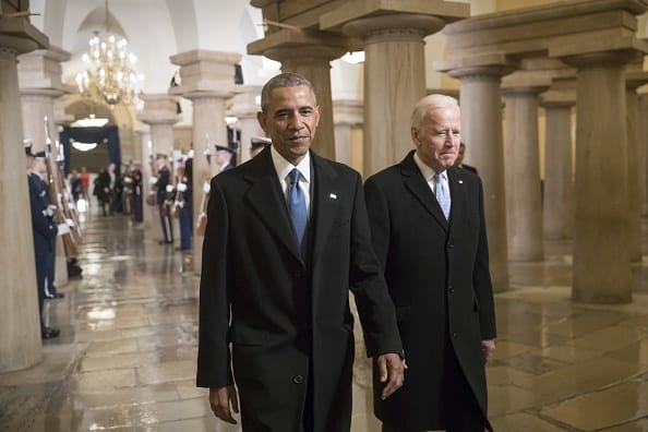 President Barack Obama and Vice President Joe Biden walk through the Crypt of the Capitol for Donald Trumps inauguration ceremony