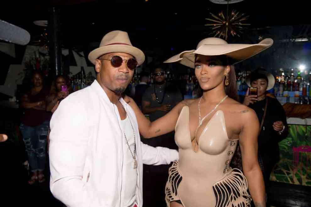 Stevie J and Joseline Hernandez wearing light colors
