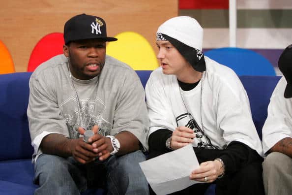 Rappers 50 Cent (L) and Eminem appear onstage during BET's 106 & Park December 4