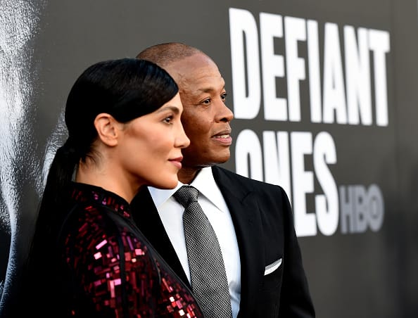 Nicole Young (L) and producer Dr. Dre arrive at the premiere screening of HBO's "The Defiant Ones" at Paramount Studios on June 22