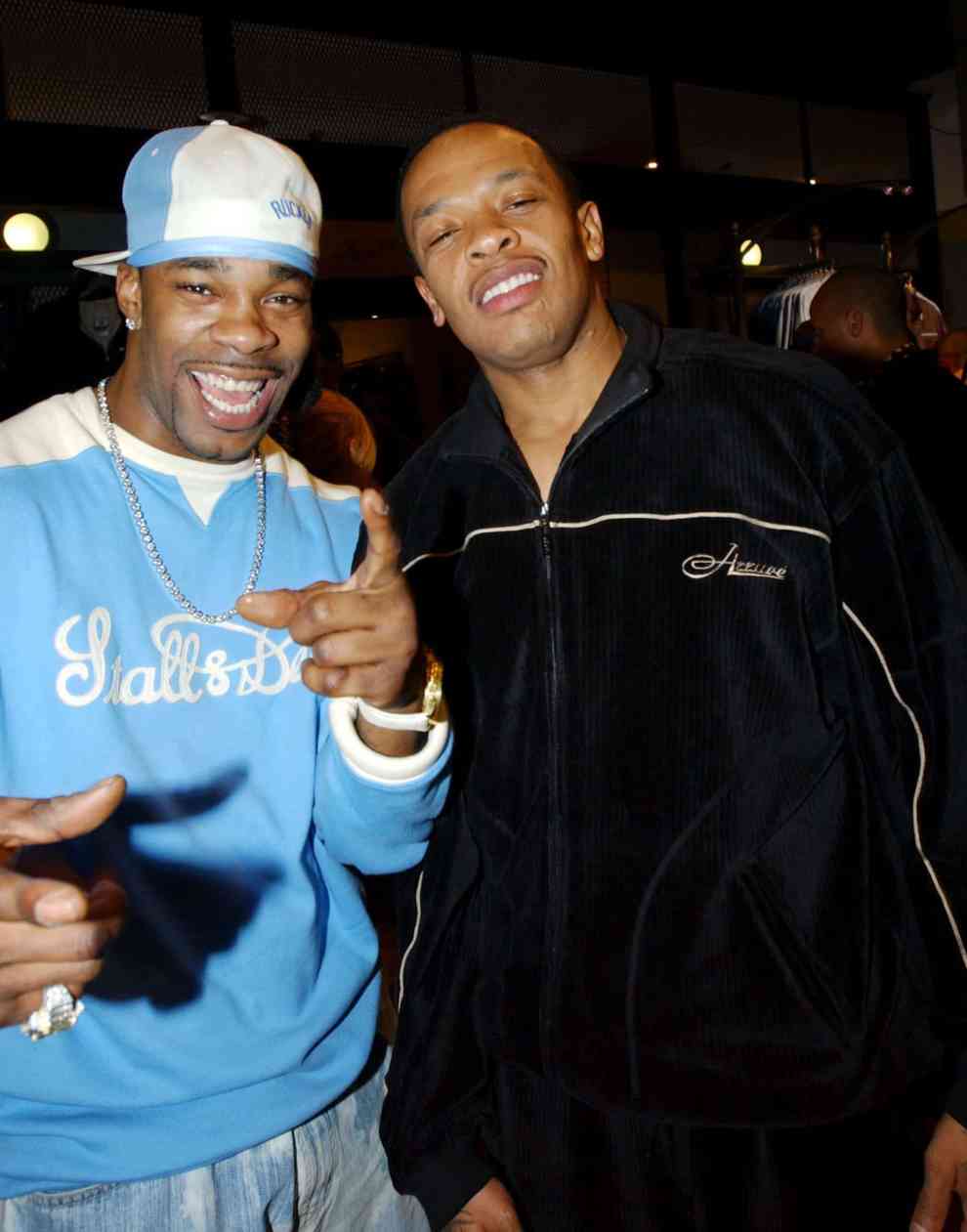 Busta Rhymes and Dr. Dre wearing blue and black