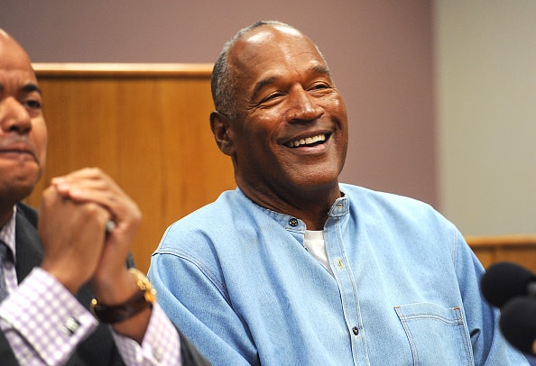 Former professional football player O.J. Simpson smiles during a parole hearing at Lovelock Correctional Center in Lovelock
