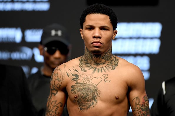 IBF junior lightweight champion Gervonta Davis poses on the scale during his official weigh-in at T-Mobile Arena on August 25