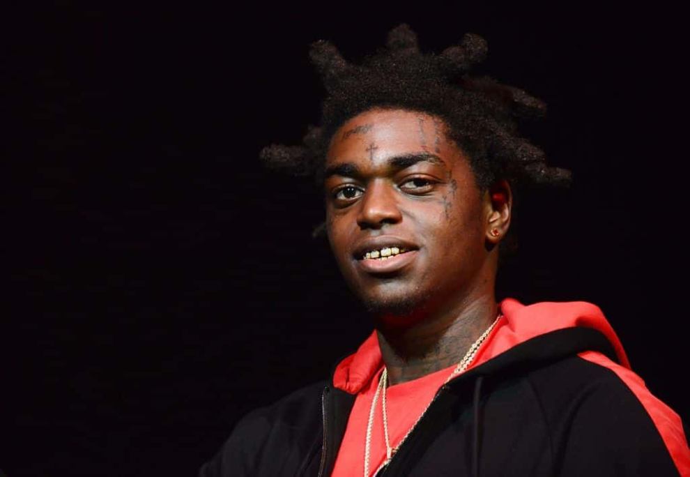 Kodak Black wearing red and black