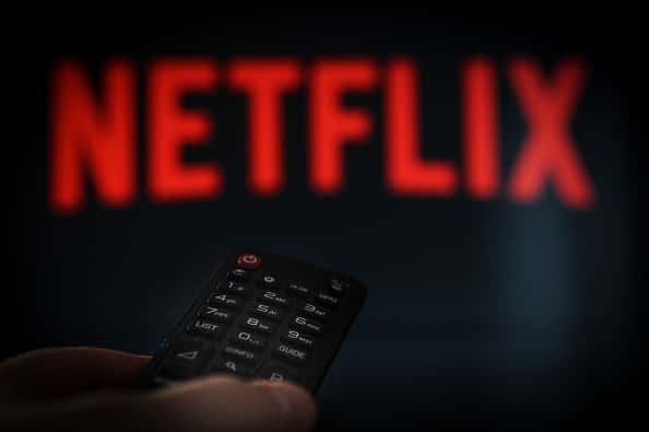 Netflix logo with remote
