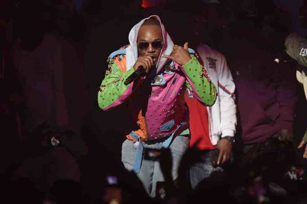 Cam'Ron wearing a multi-colored jacket