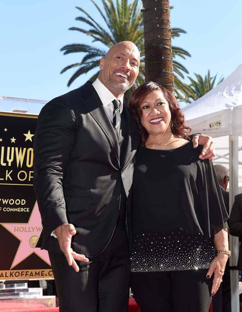 Dwayne Johnson and his mother Ata wearing all black