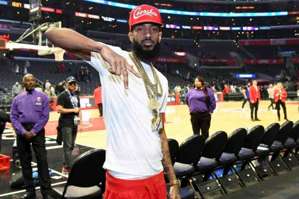 Nipsey Hussle wearing red and white