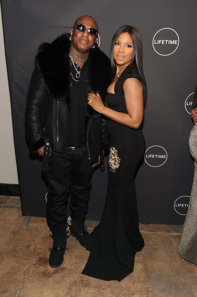 Toni Braxton and Birdman wearing all black