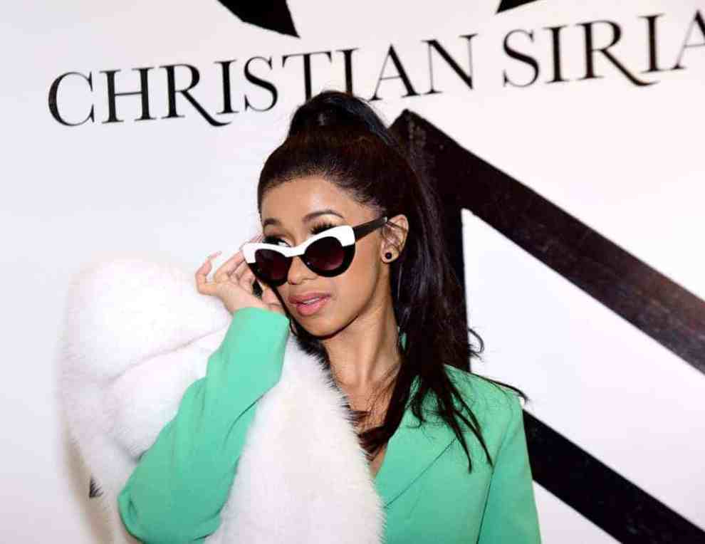 Cardi B poses backstage at the Christian Siriano show at The Grand Lodge on February 10