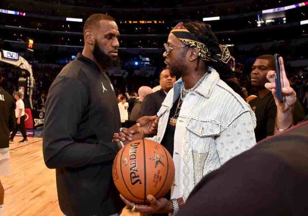LeBron James (L) and 2 Chainz attend the 67th NBA All-Star Game: Team LeBron Vs. Team Stephen at Staples Center on February 18