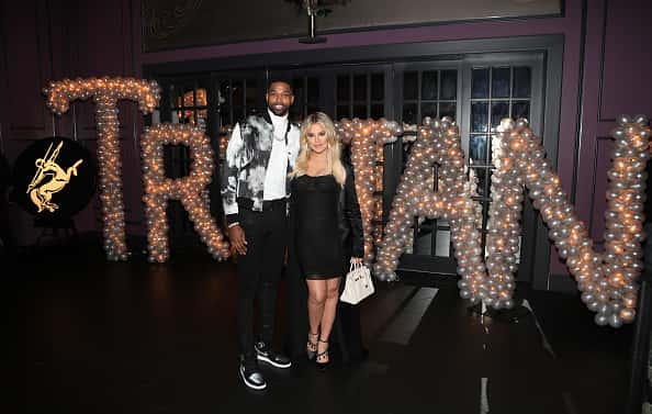 Tristan Thompson and Khloe Kardashian pose for a photo as Remy Martin celebrates Tristan Thompson's Birthday at Beauty & Essex o