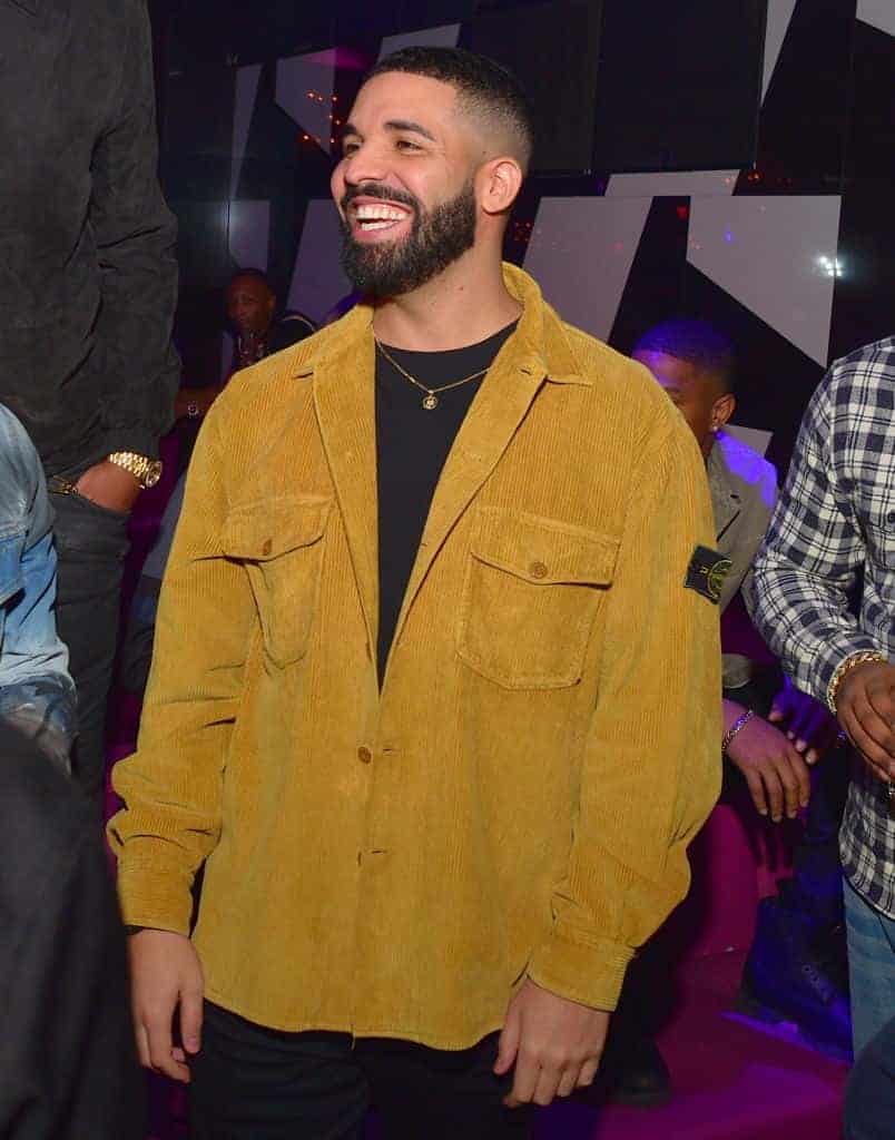 Drake in yellow button down