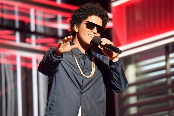 Bruno Mars speaks onstage during the 2018 Billboard Music Awards at MGM Grand Garden Arena on May 20