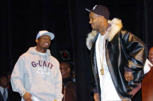Rappers 50 Cent (left) and The Game share the stage during a news conference at the Schomburg Center for Research in Black Culture in Harlem
