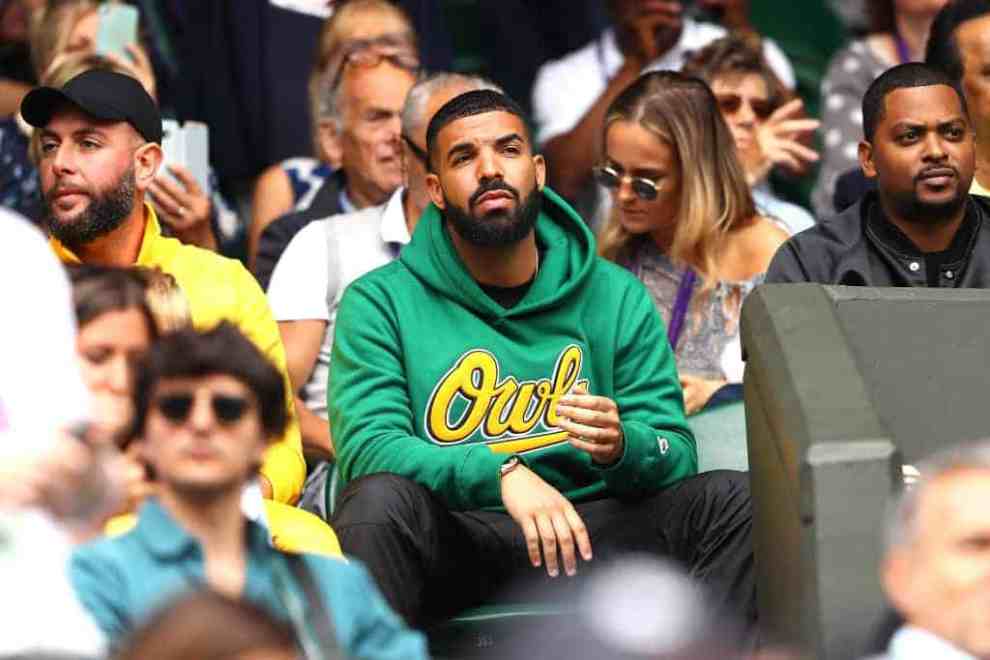 Drake in green owls sweatshirt