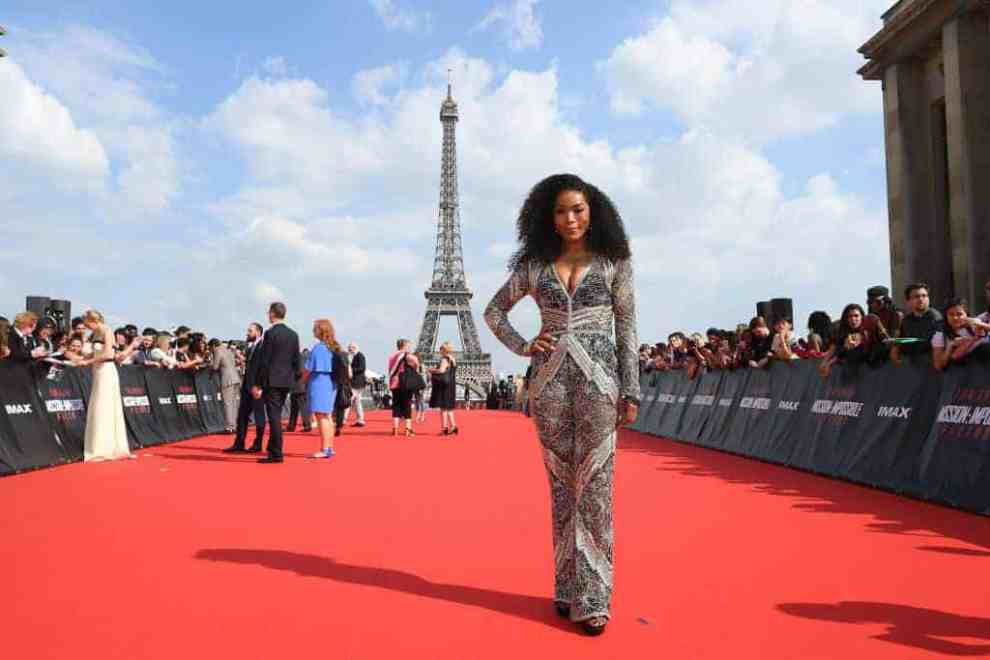 Angela Bassett on red carpet in front of Eiffel Tower