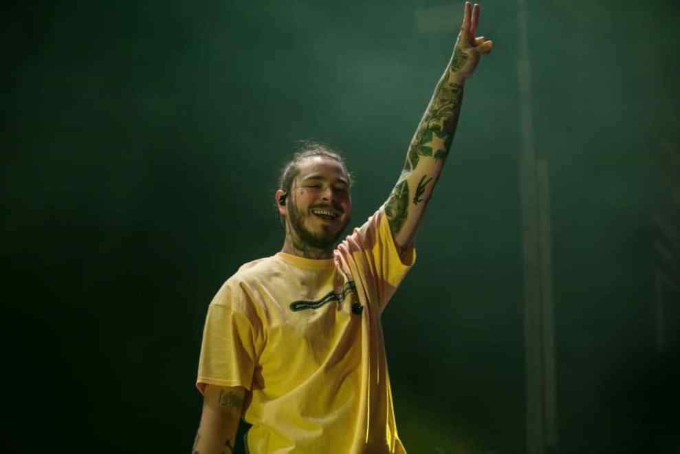 Post Malone on stage wearing Yellow