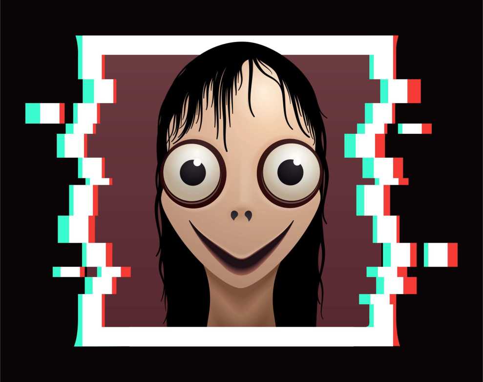 Image of the momo which is a girl with big eyes and scary features 