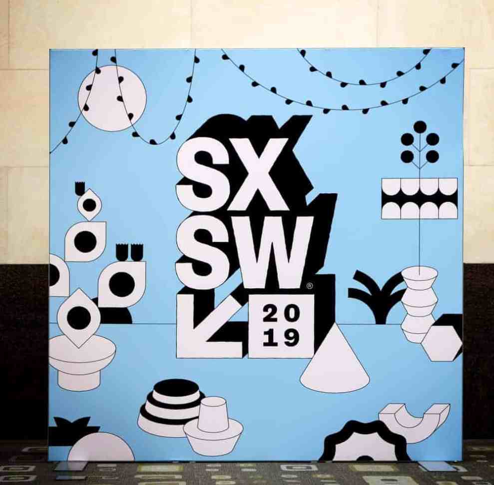 A blue poster of SXSW