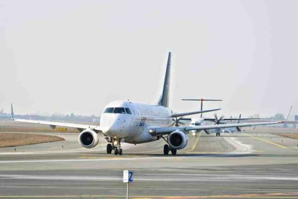 a plane landing at an airport